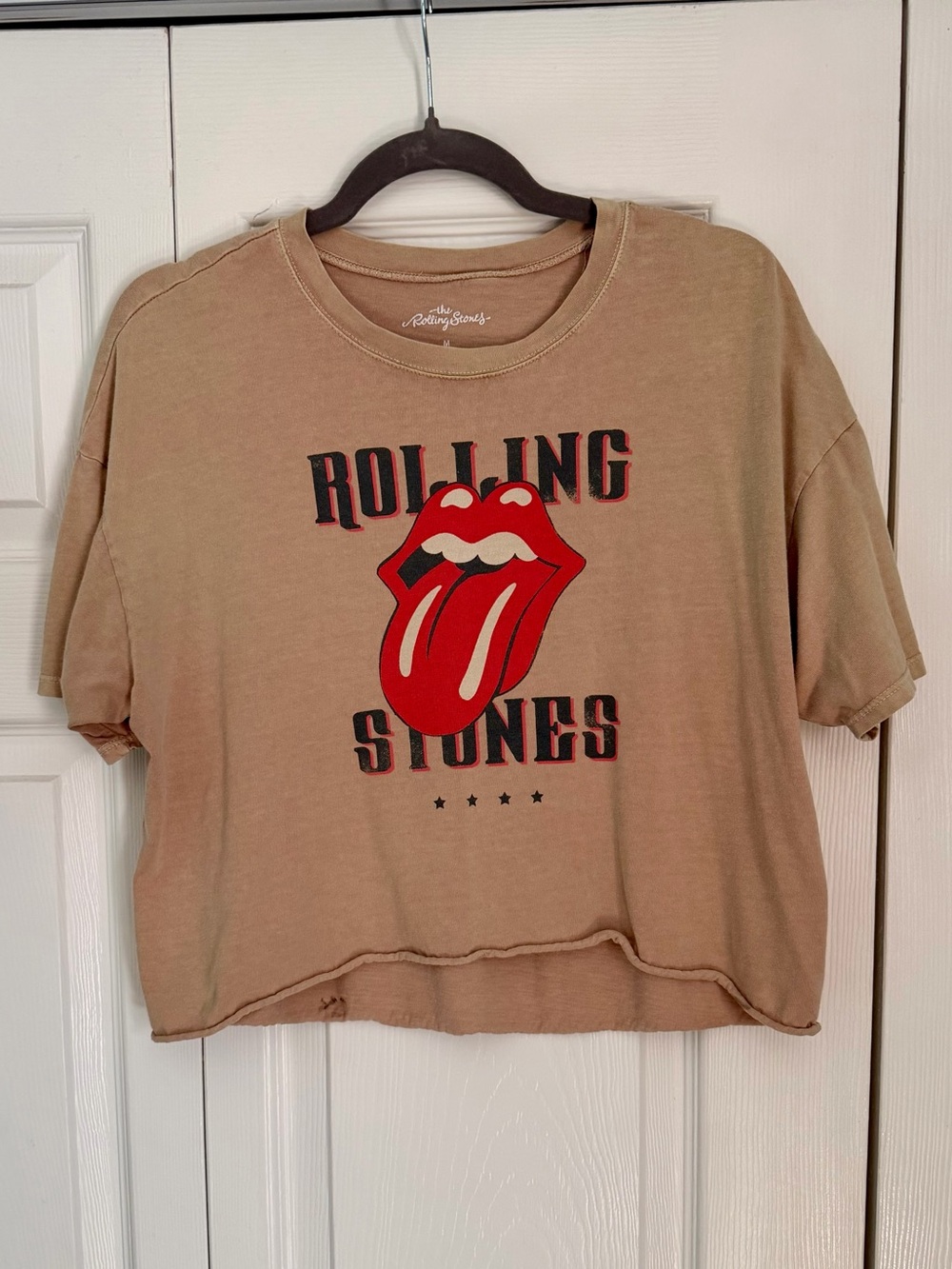 the Rolling Stones Light Pink Crop Tee with Red Tongue Graphic